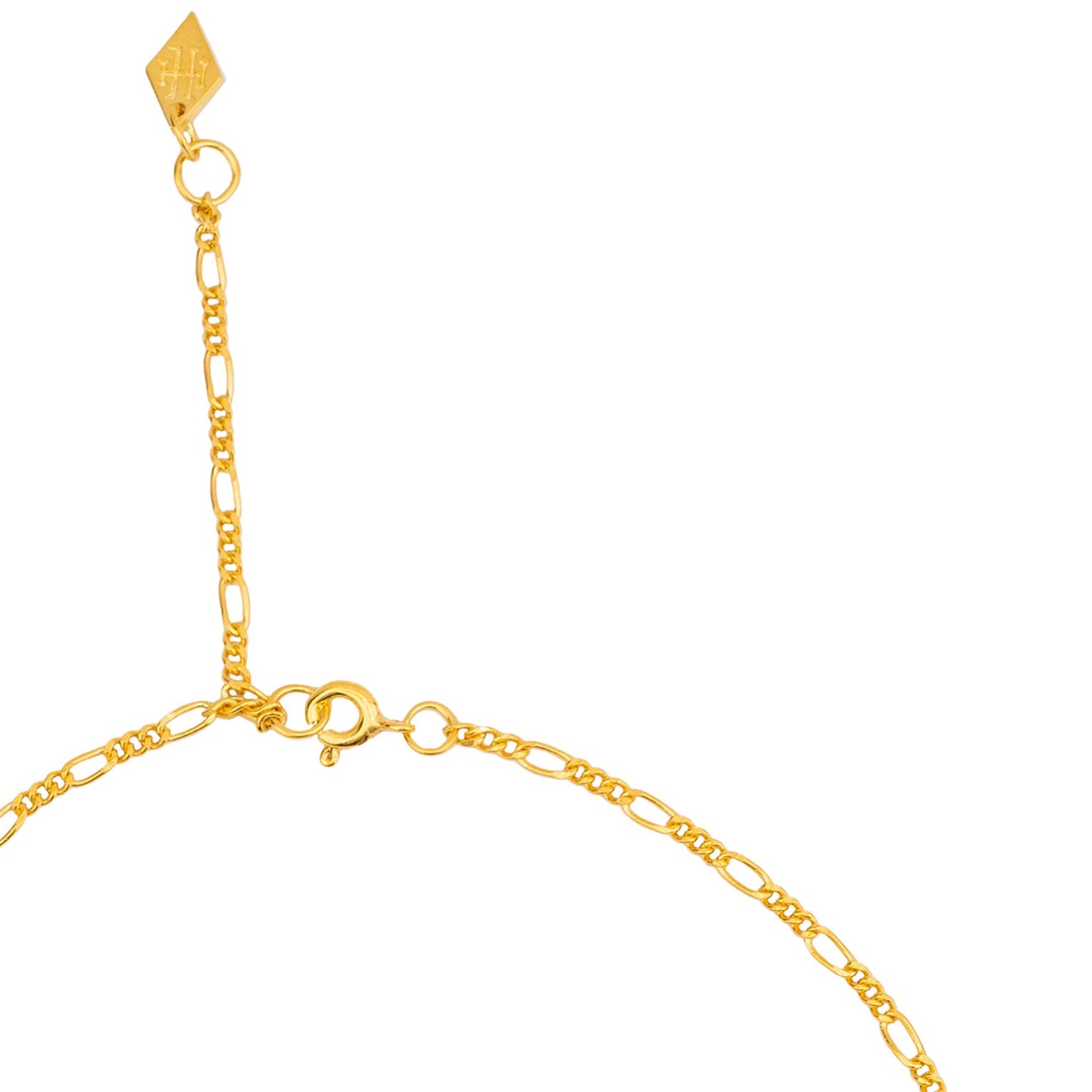 A simple gold Figaro link chain