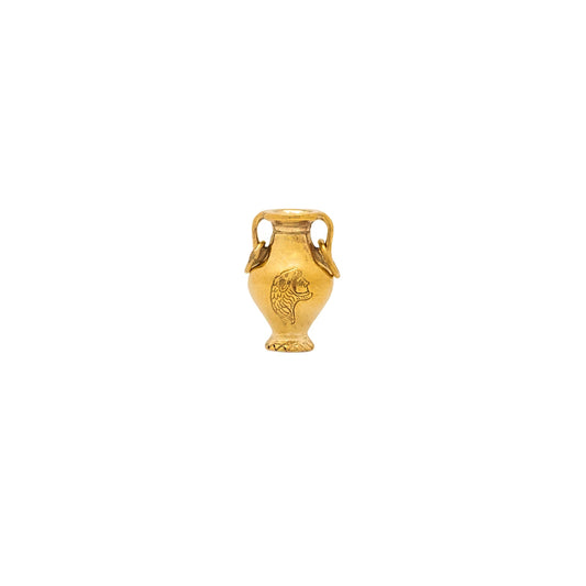 Gold urn-shaped pendant on a white background