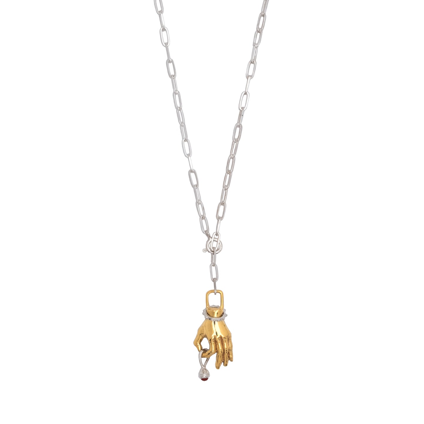 Silver necklace with a gold hand pendant holding a small silver charm