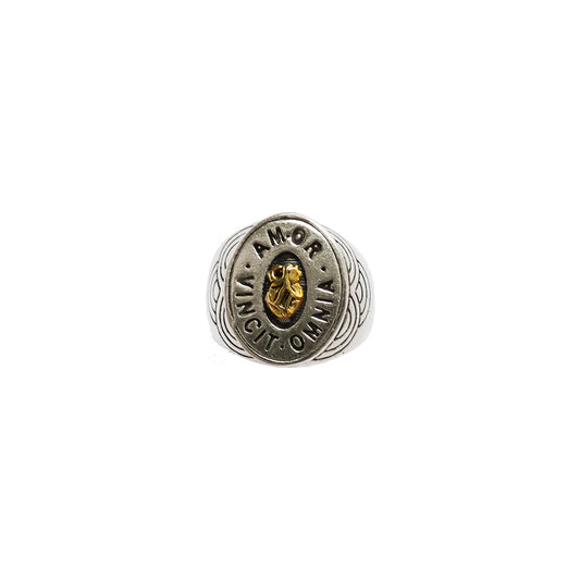 Hunt Of Hounds Love Conquers All signet ring. Anatomical heart surrounded by latin text unisex signet ring.