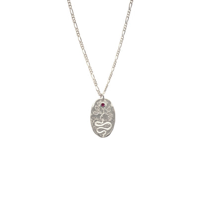 Hunt Of Hounds Equinox Necklace. Serpent and flower motif with ruby on coin pendant. Unisex.